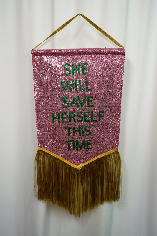 ‘She Will Save Herself This Time’ Banner