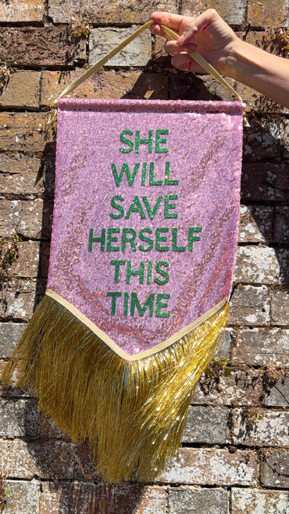 ‘She Will Save Herself This Time’ Banner